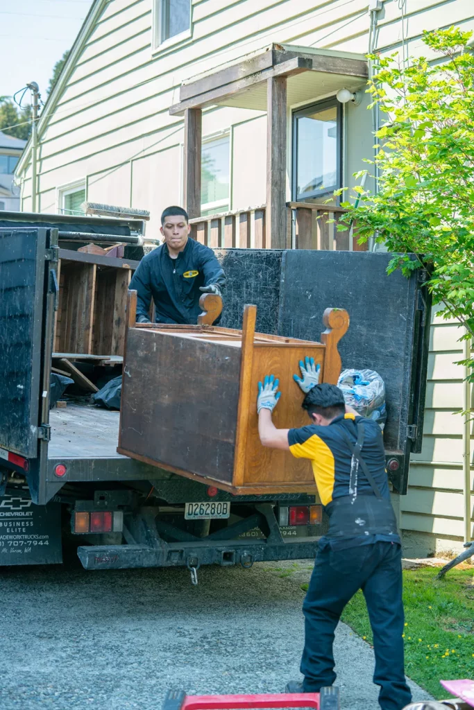 Two men doing furniture removal in Seattle