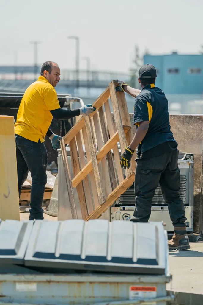 Two men do junk removal in Seattle