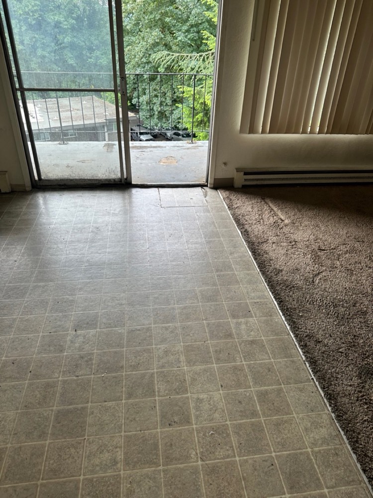 99 Junk Removal cleared apartment unit, broom-swept and turnover-ready